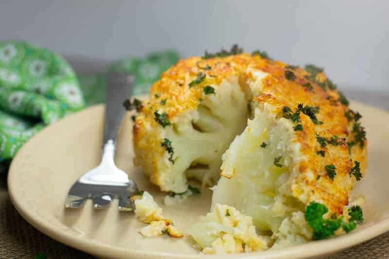 baked whole cauliflower with mayonnaise and cheese